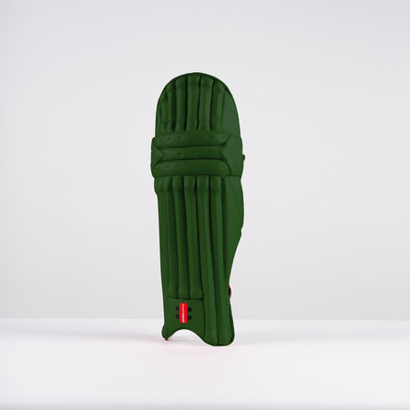 A single green Gray Nicolls Classic Prestige Batting Pad 2026 stands upright on a white surface against a plain light gray background.