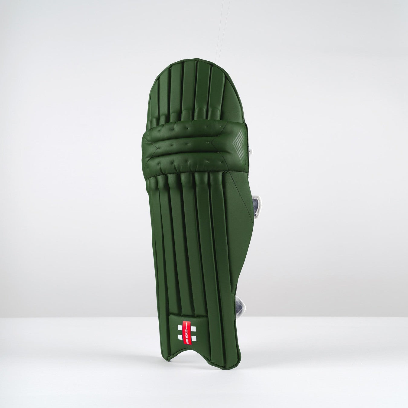 A single Gray Nicolls Classic Select Batting Pad 2026 in green stands upright with horizontal and vertical padding against a plain white background.