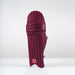The Gray Nicolls Classic Select Batting Pads 2026 in maroon stand upright on a white surface with a light gray background, featuring horizontal and vertical padding lines for lightweight comfort and HDF EVA protection.