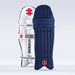 Two Gray Nicolls Academy Coloured Batting Pads - GEM stand upright against a light background—one is white with black and red details, the other is navy with a red and white Gray Nicolls label near the bottom.