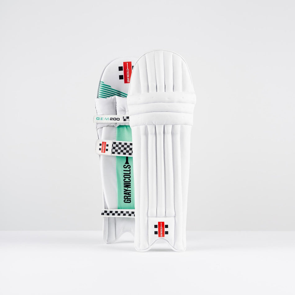Two Gray Nicolls GEM 3.0 200 Batting Pads 2026 stand upright, showing green, black, and red branded accents and adjustable straps. Lightweight design offers protective comfort, with Gray Nicolls branding visible on the side.