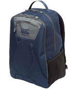 The Canterbury Classic Backpack by Canterbury comes in navy, featuring ergonomic shoulder straps, a front zipper pocket, top handle, mesh side pocket, visible logo, modern structured design, and a padded laptop compartment for protection.