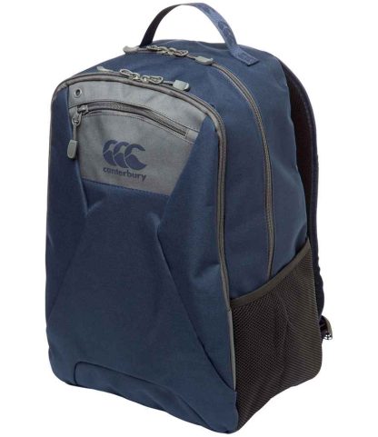 The Canterbury Classic Backpack by Canterbury comes in navy, featuring ergonomic shoulder straps, a front zipper pocket, top handle, mesh side pocket, visible logo, modern structured design, and a padded laptop compartment for protection.