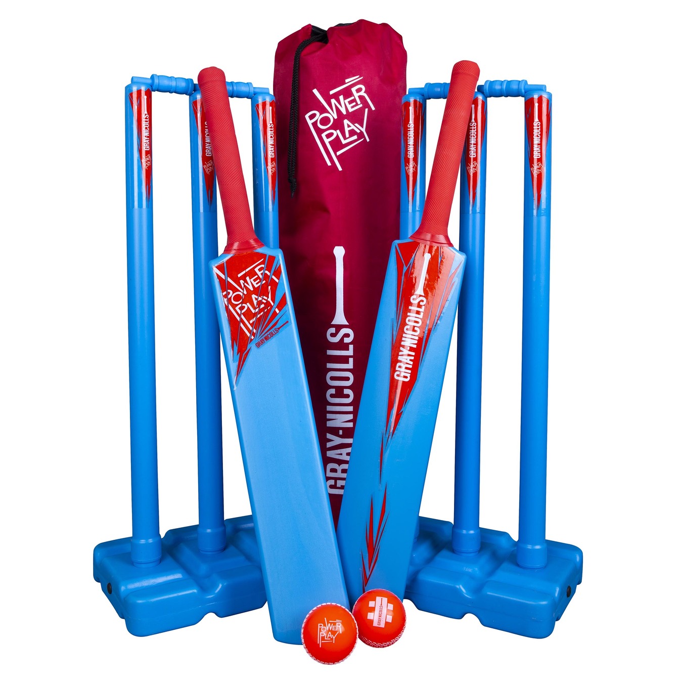 The Gray Nicolls PowerPlay Blue Kit includes two blue and red bats, two sets of blue stumps with stands, two orange balls, and a red carrying bag—ideal for kids’ cricket matches outdoors.