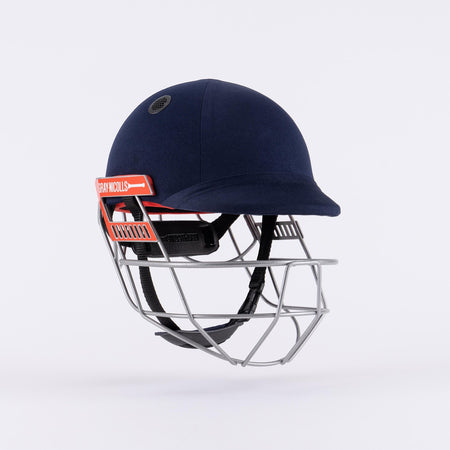 The Gray Nicolls Ultimate 360 Pro Cricket Helmet in navy features neck protection, a titanium face grille, black chin strap, and a red Gray Nicolls label on the side, set against a plain white background.