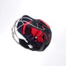 The Gray Nicolls Evo Pro Cricket Helmet by Gray Nicolls, shown from above with a titanium faceguard, dark outer shell, and red interior padding on a white background, offers advanced protection similar to modern catcher’s helmets.