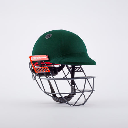 The Gray Nicolls Ultimate 360 Helmet is a green cricket helmet with a 360 faceguard for enhanced jaw protection and red Gray Nicolls branding on the side, displayed against a plain white background.