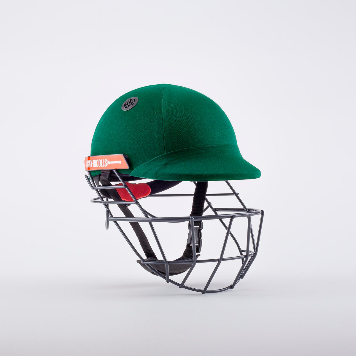 The Gray Nicolls Atomic 360 Helmet in green features a black metal faceguard and a red and white side label. Displayed on a plain white background, this helmet by Gray Nicolls offers essential protection for cricketers.