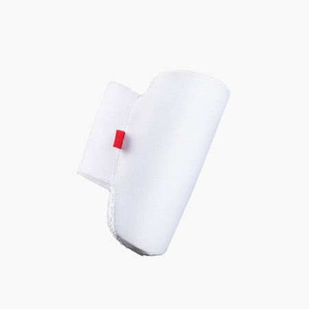 The Gray Nicolls Mini Pro Edition Arm Guard, a white protective gear for junior cricket, features a red tag and is displayed against a plain white background.