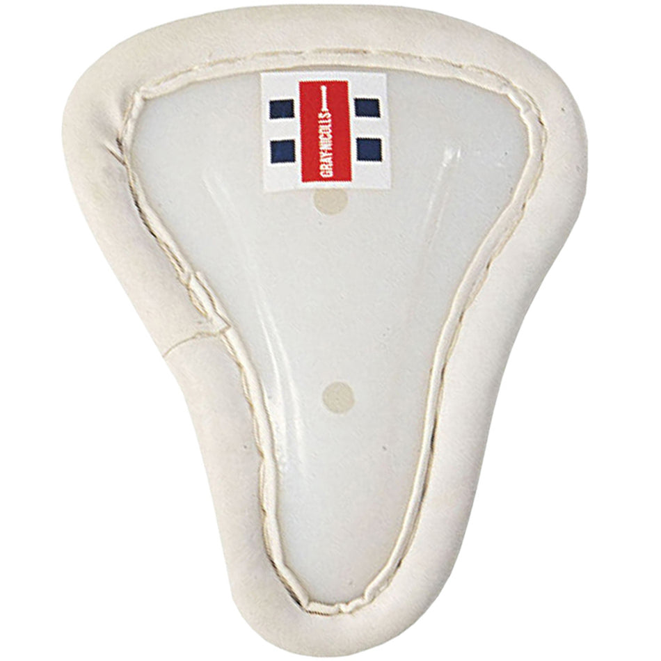 The Gray Nicolls Female Abdo Guard is a white women's cricket box with padded edges and a small red and blue label at the top, combining style, comfort, and protection.
