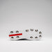 The image shows the underside of the Gray Nicolls Revo Pro 3 Cricket Spikes, a white lightweight cricket shoe with metal studs and a red REMOVABLE section near the heel, ideal for test level cricket. Brand: Gray Nicolls.