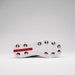 The underside of a white Gray Nicolls Players 4.0 Cricket Spikes shoe with metal studs and a red rectangular “Gray Nicolls” logo on the sole, shown against a plain light gray background.
