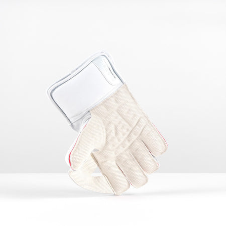 The Gray Nicolls Classic Players Edition WK Gloves 2026 are premium white leather cricket gloves with octopus grip padding on the fingers and palm, and a wide wrist strap, shown standing upright on their cuffs against a plain background.