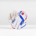 A pair of Gray Nicolls Classic Academy WK Gloves 2026 in white, blue, and red are shown upright against a plain white background, with one glove displaying the palm side and the other showing the back.