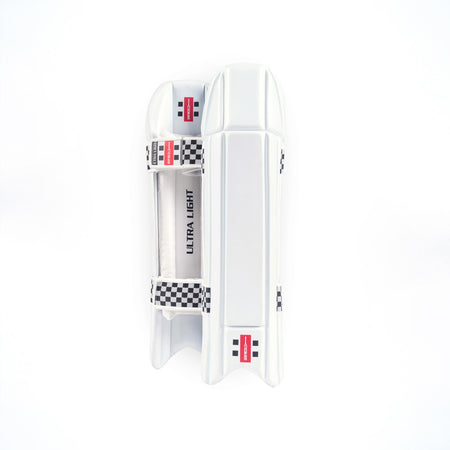 The Gray Nicolls Super Lite WK Pads 2026 are lightweight wicketkeeping pads featuring a white design with black and white stripes and durable EVA foam for reliable shin protection.