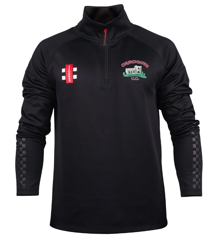 The Gray Nicolls Churchdown CC Pro Thermo Fleece is a black long-sleeve quarter-zip pullover with a red zipper, checkered lower sleeves, and embroidered club badge plus a cricket emblem on the chest.