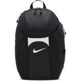 The Nike Academy Team Backpack in Black/White features a white Swoosh, Storm-FIT rain protection, a top handle, side pockets, and zippered compartments.