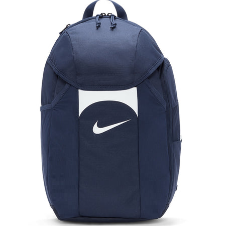 The Nike Academy Team Backpack in Navy/White features a white Nike swoosh, Storm-FIT rain protection, top handle, zippered main compartment, and side pockets.