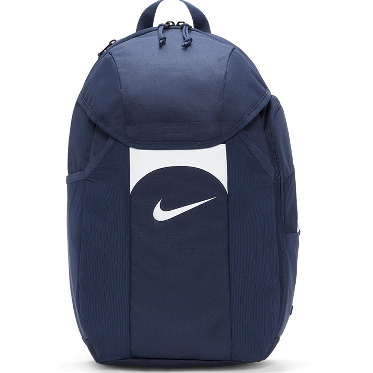 The Nike Academy Team Backpack in Navy/White features a white Nike swoosh, Storm-FIT rain protection, top handle, zippered main compartment, and side pockets.