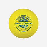 The Kookaburra Dimple Standard Hockey Ball is a yellow ball with the blue Kookaburra logo and "Dimple Standard hockey ball Made in Australia" text, approved for FIH 'National Elite' competitions.