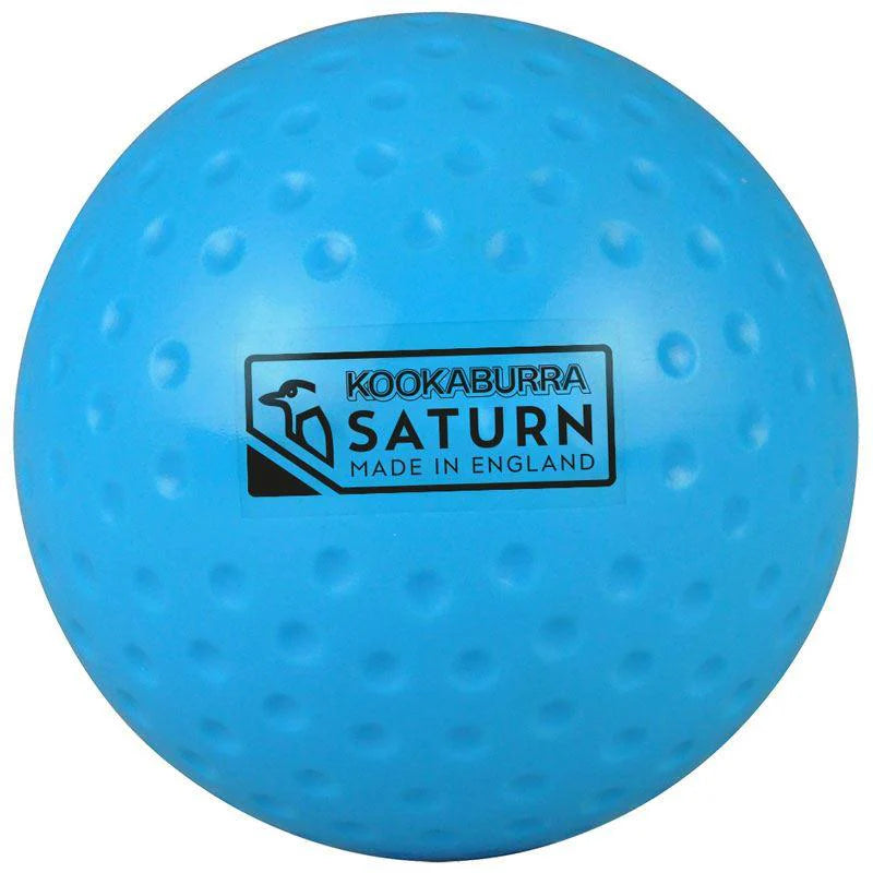 The blue Kookaburra Dimple Saturn Hockey Ball features a rectangular "Kookaburra Saturn Made in England" label with a bird logo—perfect for school hockey or training sessions.