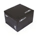 The Exsom Multi Plyobox is a black, rectangular plyobox with "Exsom" on the top and side, featuring 12” and 16” height markings on the edges. Ideal for jump training, it’s shown here on a white surface.