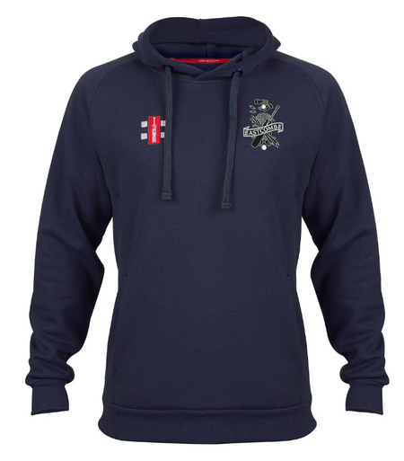 The Gray Nicolls Eastcombe CC Velocity Hoodie is navy blue with a front pocket, crossed bats and East Zone logo on the left chest, plus a small red and white rectangular badge on the right chest.