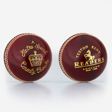 Two red Readers Extra Special A cricket balls, hand-stitched from alum-tanned leather with gold stitching and text—one reads "A Extra Special County Crown" with a crown, the other "Testom Kent Readers England.