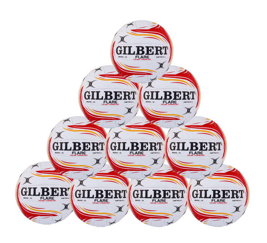 A pyramid stack of the Gilbert Flare Netball Ten Pack displays elite match-quality netballs, each white with red and yellow streaks, featuring the GILBERT branding.