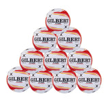 A pyramid stack of the Gilbert Flare Netball Ten Pack displays elite match-quality netballs, each white with red and yellow streaks, featuring the GILBERT branding.