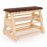 The Niels Larsen Vaulting Bar Box - Hide Top by Niels Larsen features three wooden steps, side rungs, and a cushioned natural hide top—ideal for gymnastics or physical education activities.