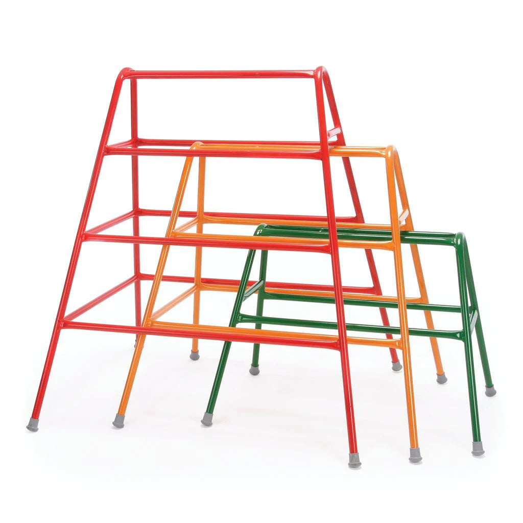 The Niels Larsen Agility Trestle - set of 3 by Niels Larsen features red, orange, and green powder-coated steel trestles with triangular frames and non-marking rubber feet for stability and floor protection.