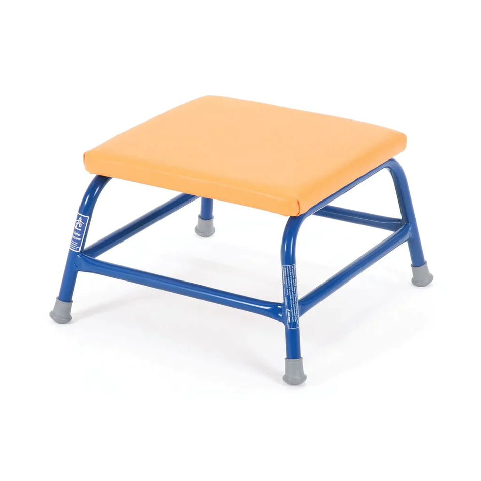 The Niels Larsen Agility Table set of 6 with Trolley features small, square stools with cushioned orange seats and blue metal legs with gray rubber tips, offering stability and support—ideal for versatile use in active spaces.