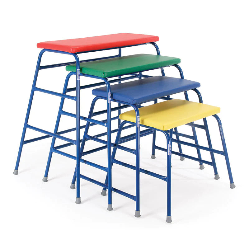 The Niels Larsen Agility Table SET 2 includes four gym tables by Niels Larsen with colored vinyl tops and sturdy frames, arranged from smallest to largest—ideal for linking activities in various group exercises.