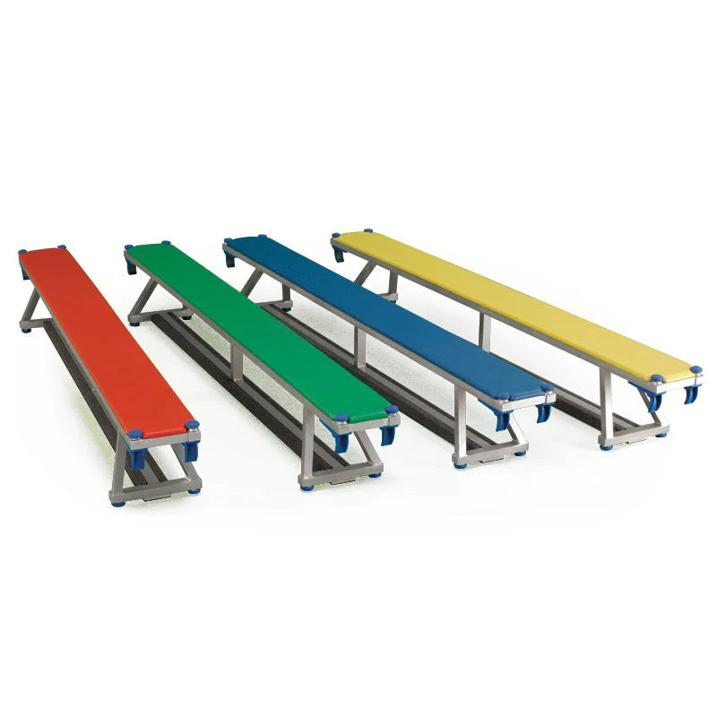 A Niels Larsen Litabench Timber Top 2.4m bench in red, featuring a sturdy metal frame, colorful timber top, and protective corner caps, is part of the Niels Larsen range designed for primary schools.