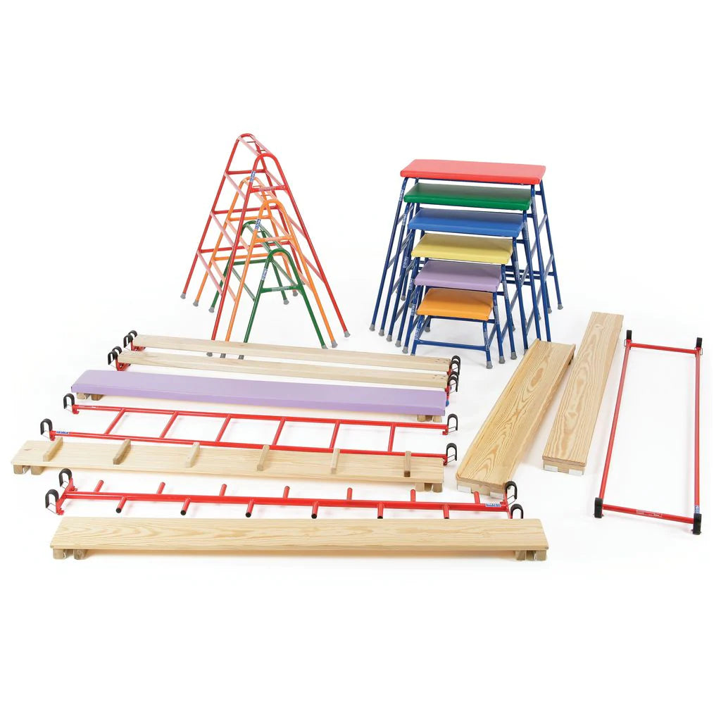 The Niels Larsen Agility Set by Niels Larsen features stackable benches, a timber balance beam, climbing frames, and metal ladders, all gymnastic equipment arranged on a white background.
