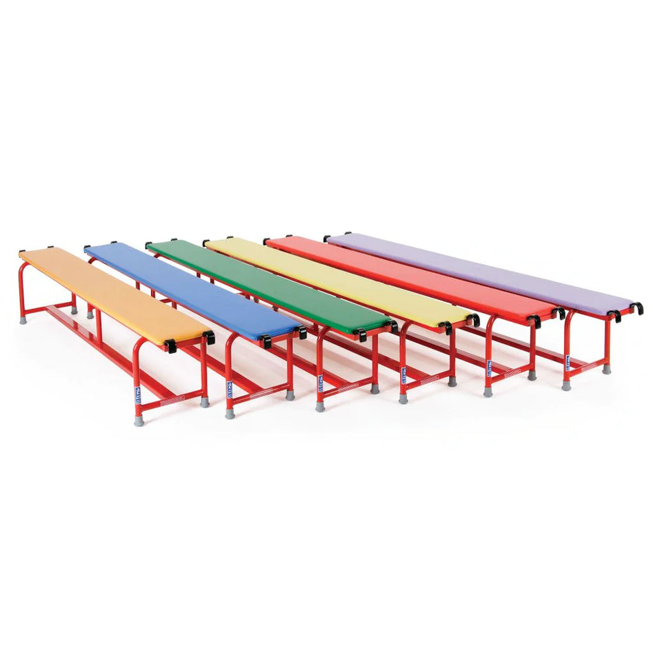 A Niels Larsen Steel Bench with Upholstered Top 2m by Niels Larsen is shown in red, featuring a durable powder coated steel frame, displayed against a white background.