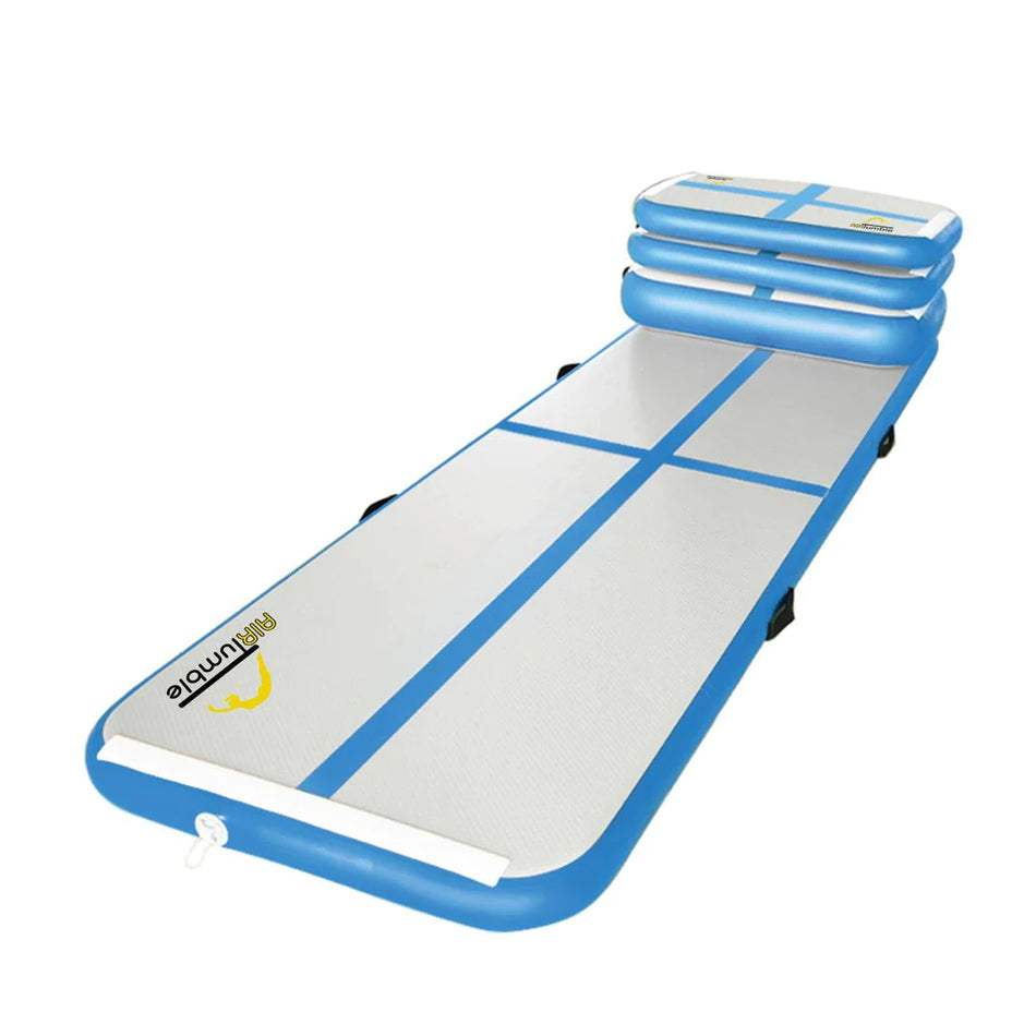 The Niels Larsen Airtumble Track Set by Niels Larsen features a blue and white gymnastics mat with three stacked inflatable blocks, side handles, and a corner logo—perfect versatile training equipment for tumbling and gymnastic routines.