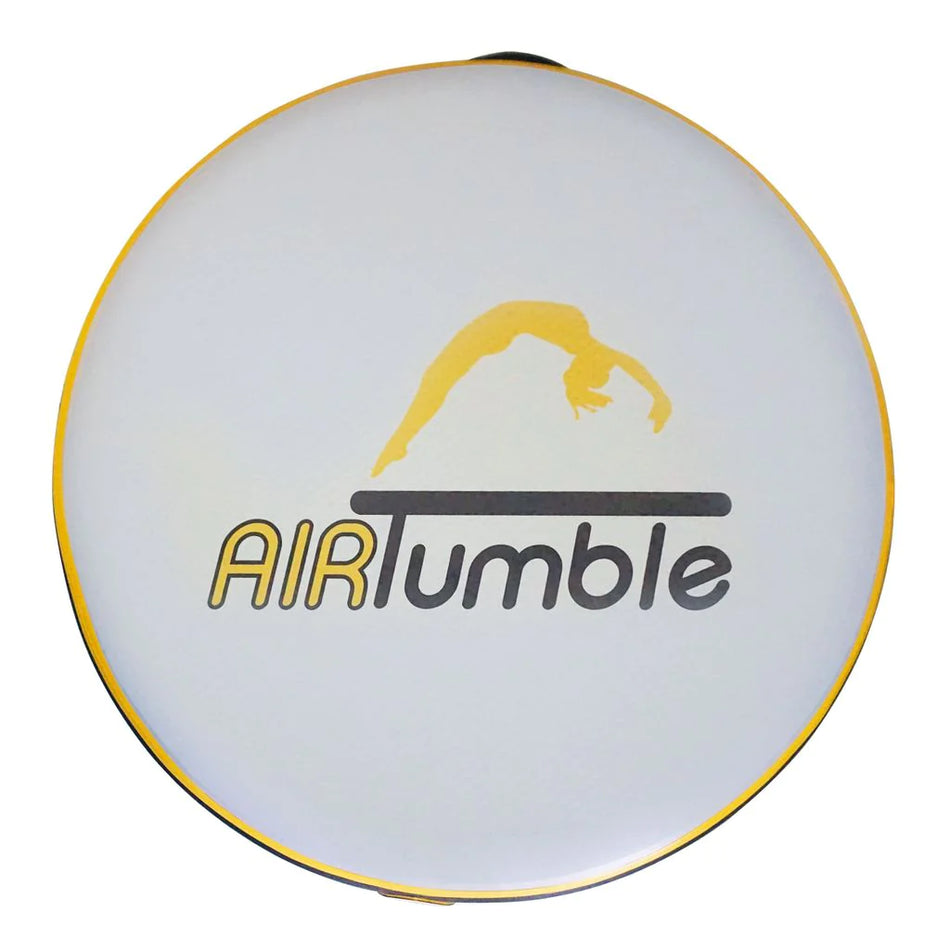 A round white carrying case with yellow edges features the Niels Larsen Airtumble Airspot logo—a yellow gymnast silhouette above "Niels Larsen." Ideal for storing your inflatable mat or foot pump.
