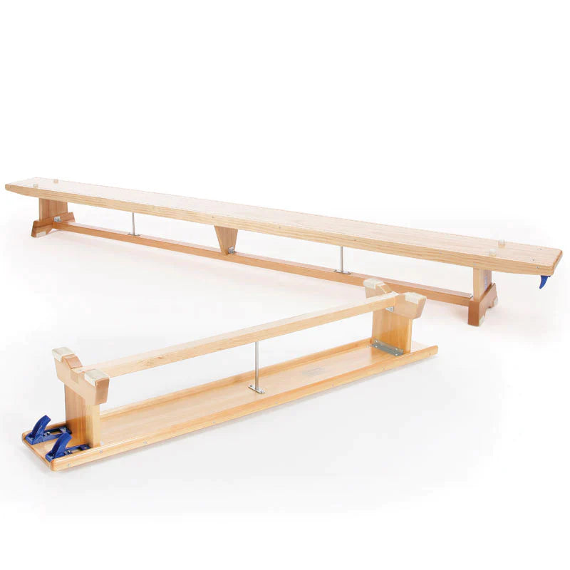 A Niels Larsen Traditional Balance Bench 2.67m with metal supports and blue end caps is placed on a white background.