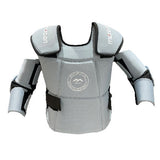 The Mercian Genesis 3 Body Armour Grey by Mercian is a light gray, padded training suit with arm and shoulder protection, black straps, and a chest logo. Lightweight and inspired by hockey goalie gear, it’s ideal for safe martial arts contact practice.