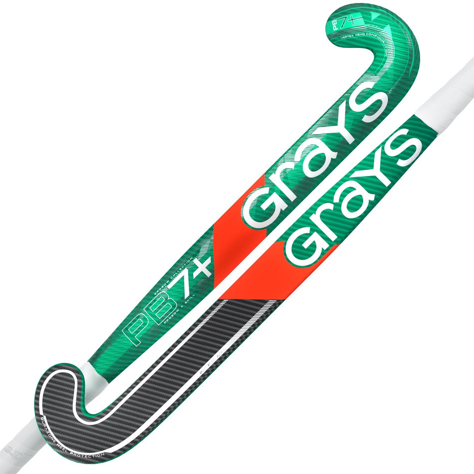 The Grays PB 7+ Senior Hockey Stick 2026 features a green and white design, bold Grays branding, black and carbon fiber head details, a red diagonal stripe on one stick, and is made for intermediate power.