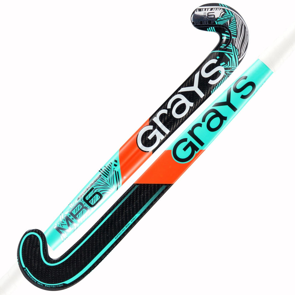 Two Grays MB6 Junior Hockey Sticks with modern black, turquoise, orange, and white geometric designs. The sticks feature the Grays logo and a midbow shape for versatile performance.