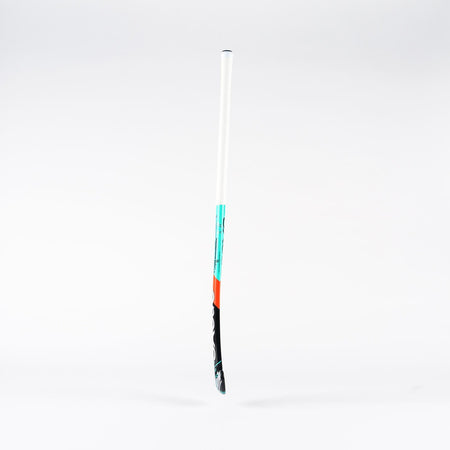 The Grays MB6 Junior Hockey Stick by Grays features an enhanced grip, a white handle with light blue and orange accents, and a black blade. It is shown upright against a plain white background.