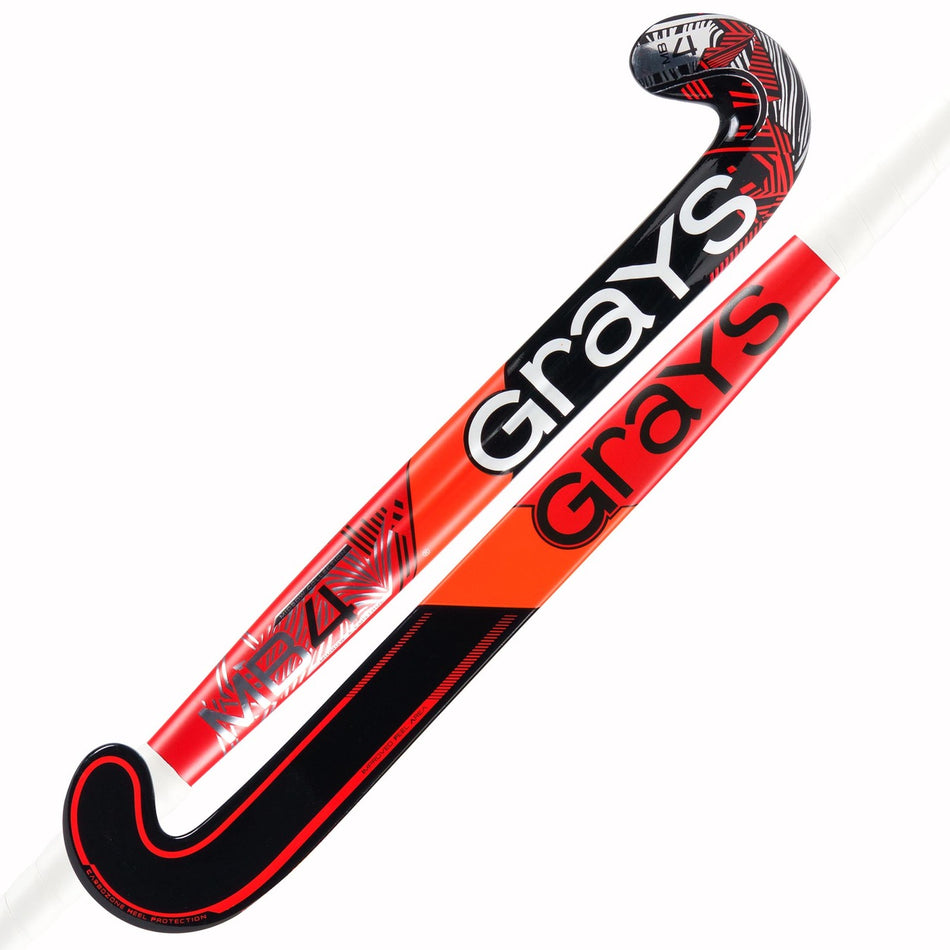 Two Grays MB4 Senior Hockey Sticks are crossed, each with bold Grays branding. Their modern red, black, and white shafts and heads are designed for enhanced torsional stability.