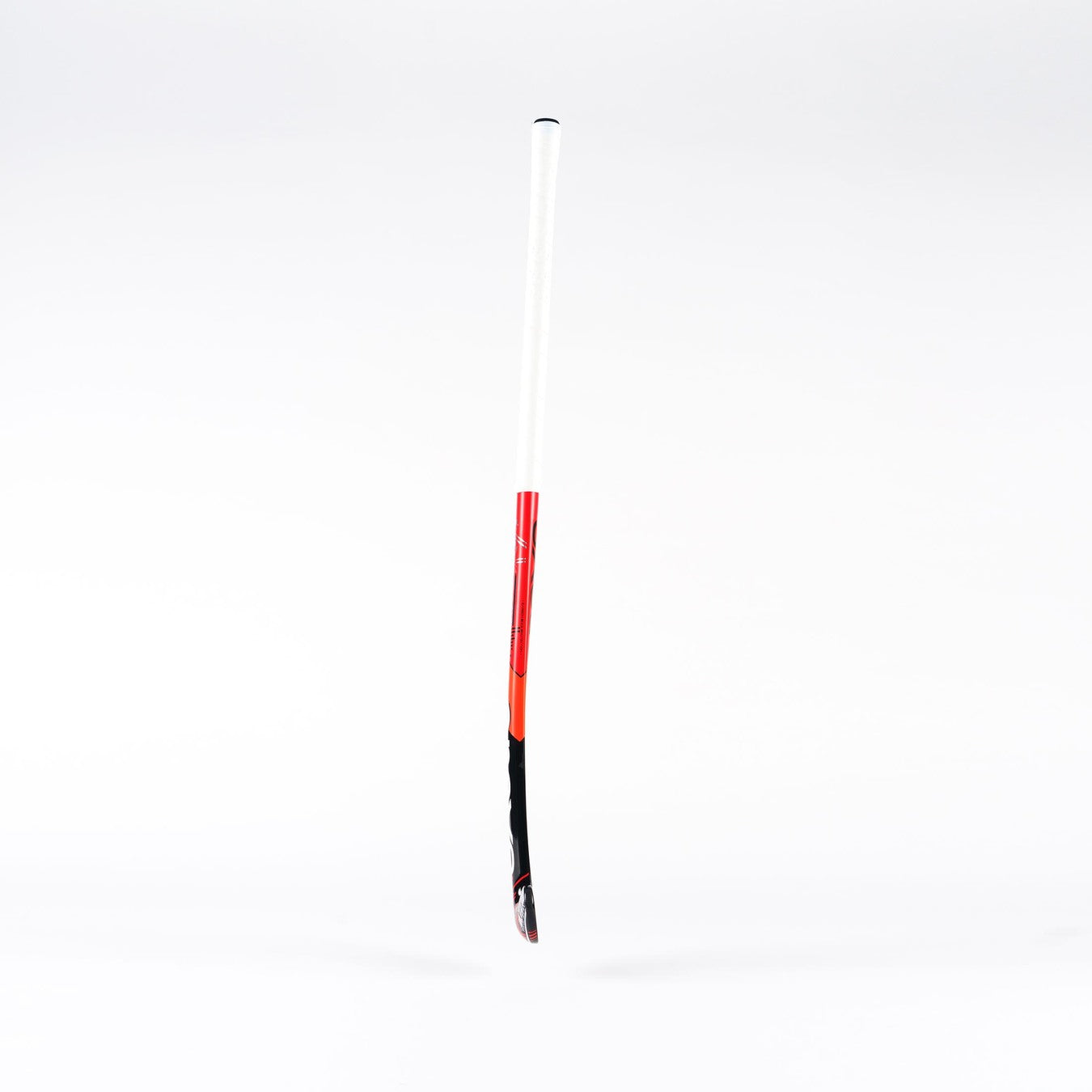 The Grays MB4 Senior Hockey Stick by Grays, featuring a black, red, and white midbow design for enhanced torsional stability, is standing upright against a plain white background.
