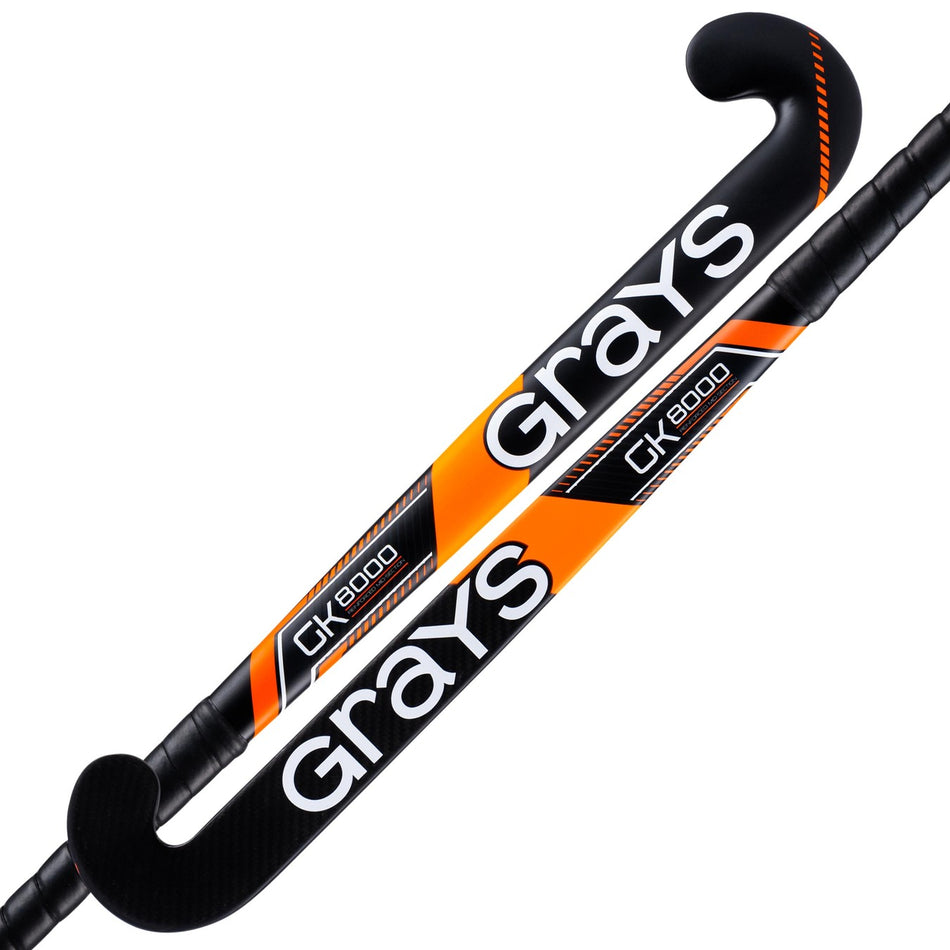 The Grays GK8000 Ultrabow Hockey Stick features black design with orange and white accents, a triple-gripped handle for superior control, and an ultrahigh balance point to enhance your performance on the field.