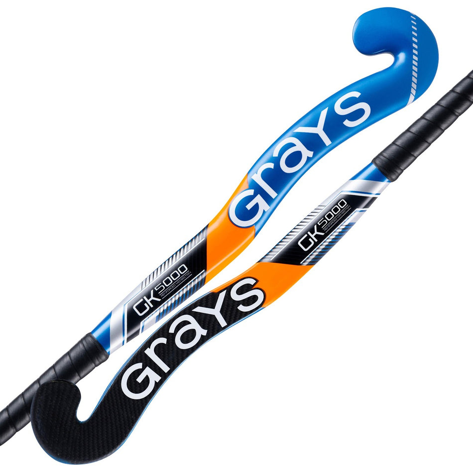 Two Grays brand GK5000 Save hockey sticks with black handles—one with blue and white accents, the other with orange, black, and white accents—both feature a reinforced mid-section for enhanced durability.