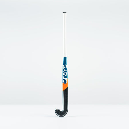 The Grays JB 6 Junior Hockey Stick 2026, featuring a white handle with blue and orange accents and "Grays" printed vertically on the shaft, stands upright against a plain white background.