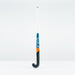 The Grays JB 6 Junior Hockey Stick 2026, featuring a white handle with blue and orange accents and "Grays" printed vertically on the shaft, stands upright against a plain white background.